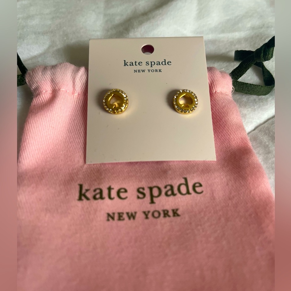 KATE SPADE NEW YORK. Round Spade Cut-out earring post studs with Crystal trim.